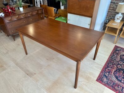 Danish Extendable Teak Dining Table by Henning Kjaernulf