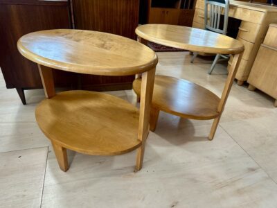 Pair of Art Deco design oval tiered side tables